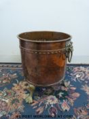 A copper coal / log bin with lion mask handles and claw feet (H42 x D35cm)