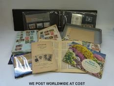 An album of stamps together with first day covers, loose stamps,