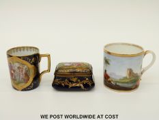 A gilt and porcelain bombe shaped snuff box decorated with Watteau scene and flower decoration