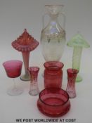 Eight pieces of clear and coloured glassware to include a vaseline posy vase,