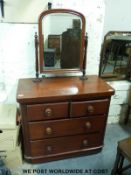A Victorian stained pine dressing chest of two over two drawers (H80cm x W92cm x D50cm)