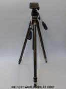 A Gitzo camera tripod marked Reporter Performance