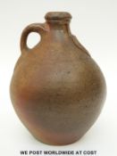 A studio pottery bellamine jar with maker's seal mark (20cm tall)