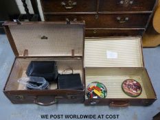 Two vintage suitcases and contents to include Harnimex 16 x 50 binoculars, polaroid camera, toys,