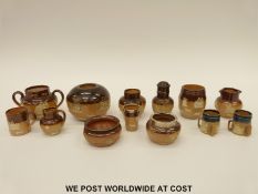 A collection of Doulton Lambeth miniature items including silver mounted, tygs, Colmans mustard,