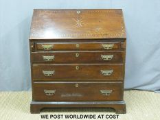 A Georgian oak bureau, the parquet inlaid fall flap opening to reveal fitted interior of drawers,