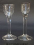 Two George II drinking glass with bucket bowls (one reeded) over plain stems raised on conical feet,