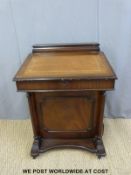 A leather inset Davenport with four graduated drawers (H88cm x W61cm x D53cm)