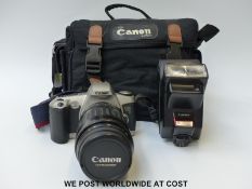 Canon EOS 500N fitted with ultrasonic 100-300mm lens,