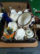 Three signed hand decorated graduated jugs with 