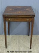 A 19th/20th century inlaid rosewood games table with single drawer and action to lift the first