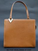 Lalique brown leather handbag with moulded glass detailing, gold plated mounts and white stitching,