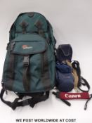 A quantity of camera carry cases, backpacks, leads, chargers etc.