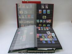 Three stockbooks of mint GB and Channel Island stamps and an empty stockbook