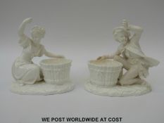 A pair of Minton blanc de chine figural salts (18cm tall)