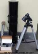 An Orion Europa 200mm Newtonian reflector telescope and tripod