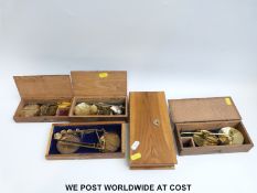 Four various cased travelling beam scales