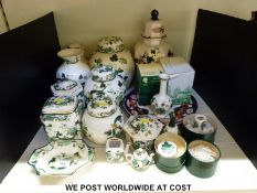 A collection of Masons to include three graduated ginger jars in Chartreuse pattern,