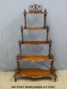 A 19thC inlaid mahogany five tier whatnot with rope twist supports raised on turned legs (H126 x