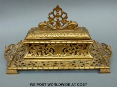 A Victorian brass inkstand by Townshend & Co,