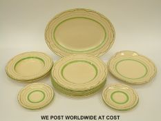 A collection of Clarice Cliff dinner ware