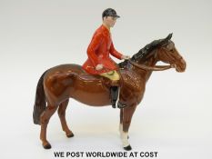 Beswick huntsman on a brown standing horse