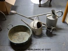 A Victorian pewter mug with spout,