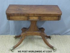 A 19thC line inlaid mahogany fold over card table on a moulded support raised on a quatrefoil base