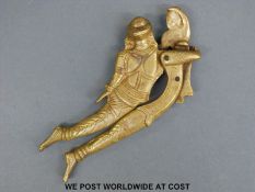 A brass Burmese or similar novelty nutcracker formed as two figures