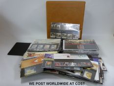 Two albums of GB presentation packs and a quantity of loose packs