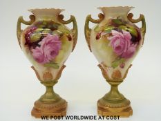 Royal Worcester pair of twin handled pedestal vases hand decorated with roses,