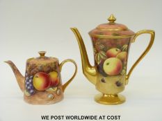 Coffee pot and tea pot each hand decorated with painted fruit,