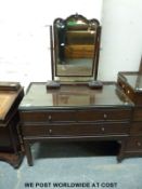 A 19thC mahogany dressing chest with protective glazed top and bevelled glass mirror (see next two