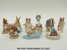 Nine Beswick Beatrix Potter figures including Tailor of Gloucester