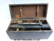 A cased brass or bronze Stanley surveyor's level