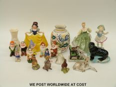 A collection of ceramics including a Beswick mouse and birds, Royal Doulton figurine, a seal on ice,