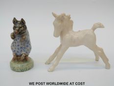 A pottery Pigwig from Beatrix Potter's The Tale of Pigling Bland and a model of a foal