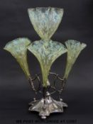 A vaseline glass epergne with four moulded flutes on silver plated base, 40cm tall.
