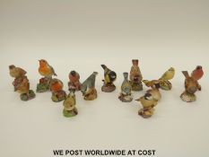 Fifteen small Royal Worcester bird figures