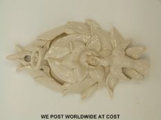 A rare ceramic wall pocket in the form of a hummingbird and nest,