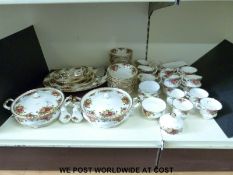 A collection of Royal Albert Old Country Roses dinner and tea ware to include cake stand, tureens,