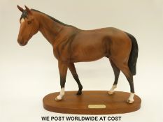 Royal Doulton racehorse 'Troy' on wooden plinth