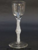 George II drinking glass with ogee bowl over multiple cotton twist stem raised on folded foot,
