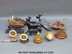 A quantity of novelty nutcrackers to include ship's wheel, cat,