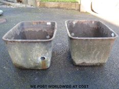 Two cast iron feed troughs or water troughs (H30 x W54 x D40cm)