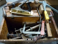 A wooden tool chest with Stanley plane and a variety of vintage hand tools including an unusual