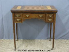 A late 19th/20th century inlaid rosewood ladies desk with fold over top to form a games table,