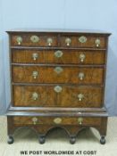 A Queen Anne walnut chest on stand, of two over three drawers, the stand having a further drawer,