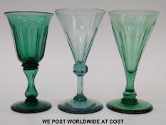 Early Victorian turquoise wine glass with petal cut conical bowl over multi-faceted knop raised on
