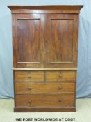 A Victorian mahogany linen press with flame mahogany doors and two over two graduated drawers